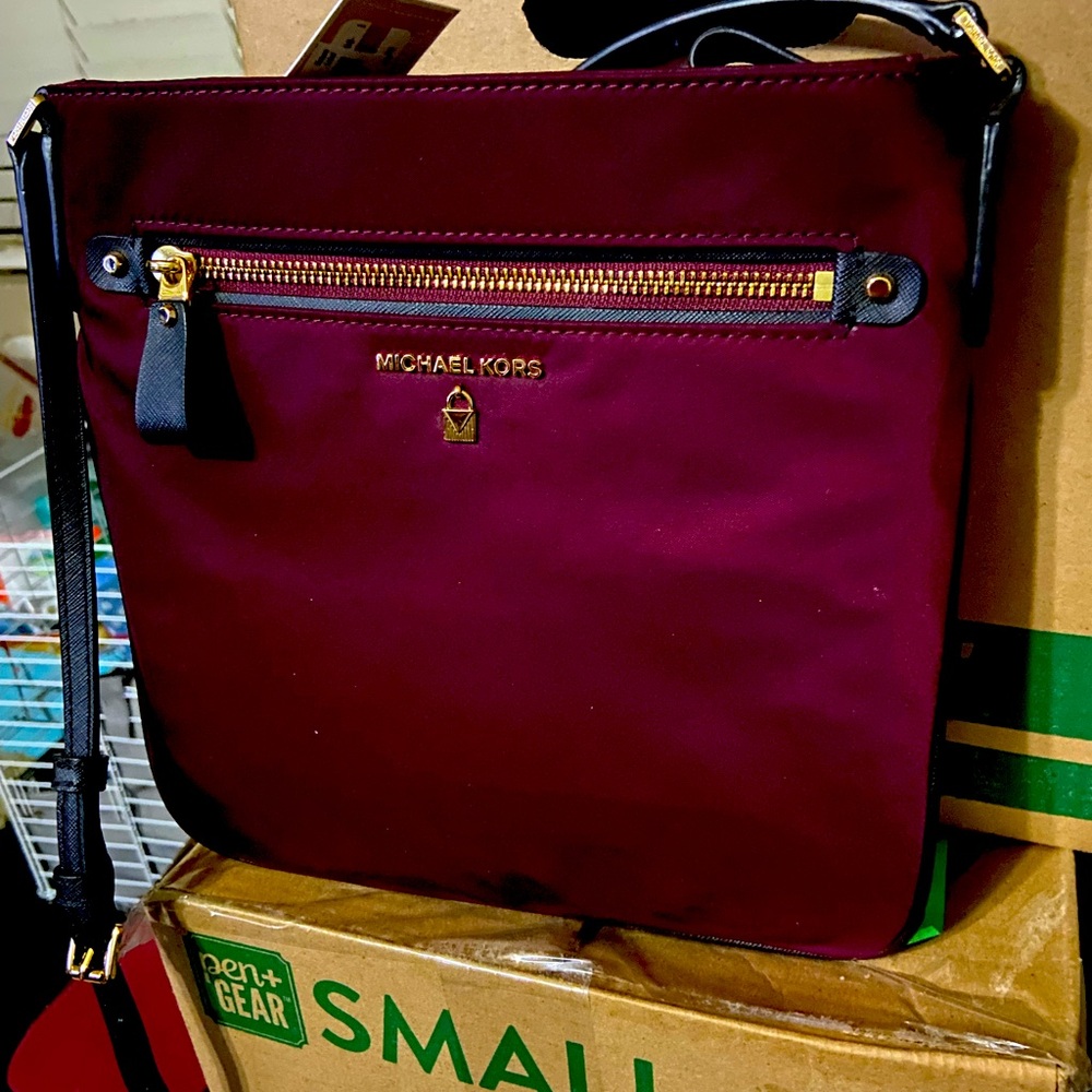 Authentic Micheal Kors cross body bag